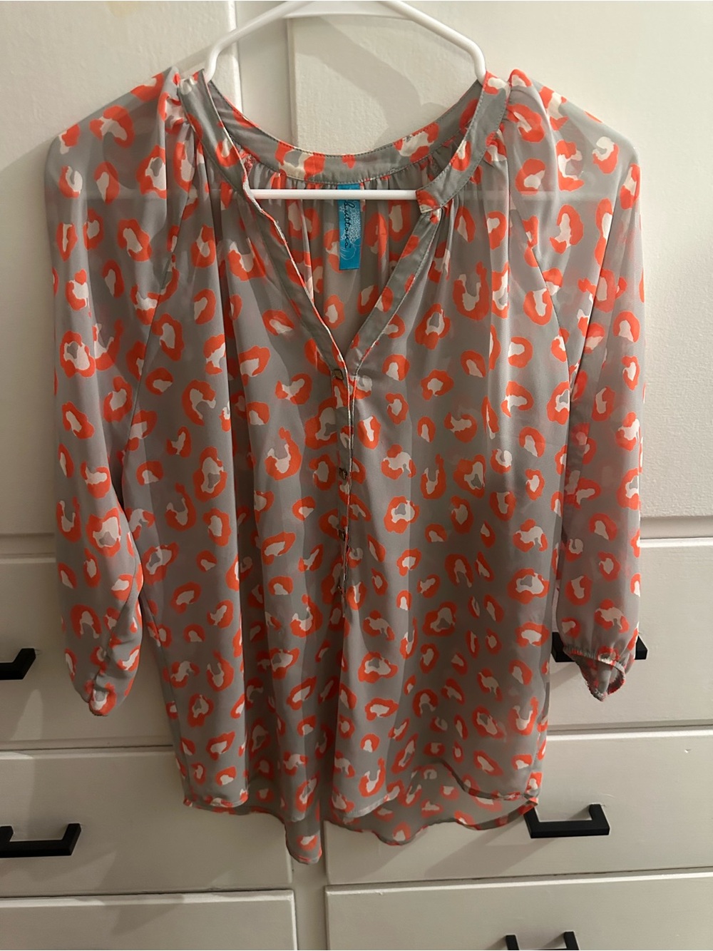 Grey blouse with orange and white leopard print